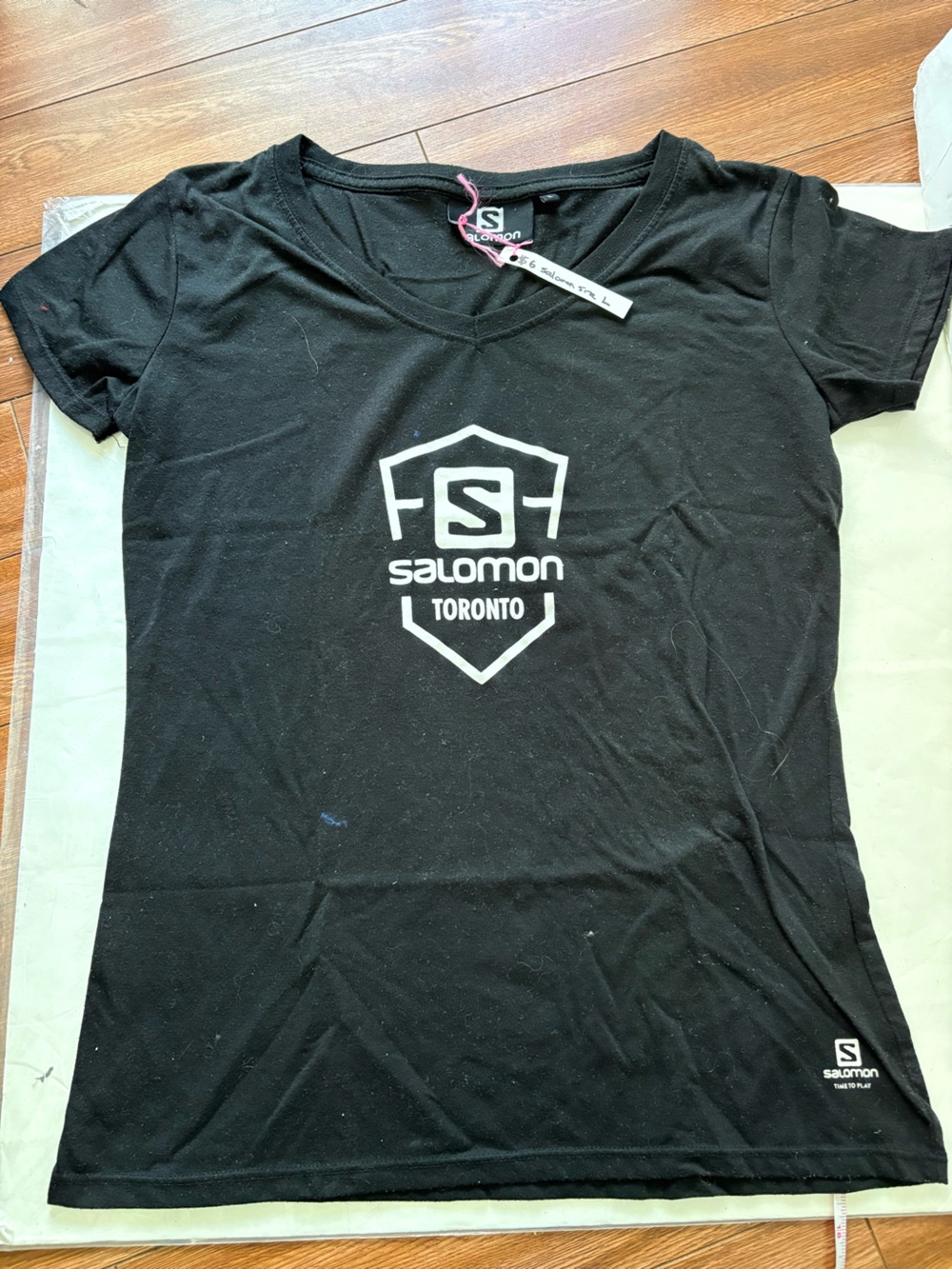 Salomon Black Short-Sleeve Logo Tee with White Toronto Graphic